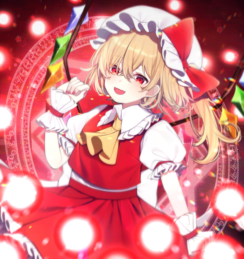 1girl :d ascot bangs blonde_hair bow cowboy_shot crystal danmaku eyebrows_visible_through_hair fang flandre_scarlet hat hat_bow highres looking_at_viewer medium_hair mob_cap open_mouth puffy_short_sleeves puffy_sleeves red_bow red_eyes red_skirt red_vest shirt short_sleeves side_ponytail skin_fang skirt smile solo spell_card standing touhou vest white_headwear white_shirt wings wrist_cuffs yellow_neckwear yurui_tuhu