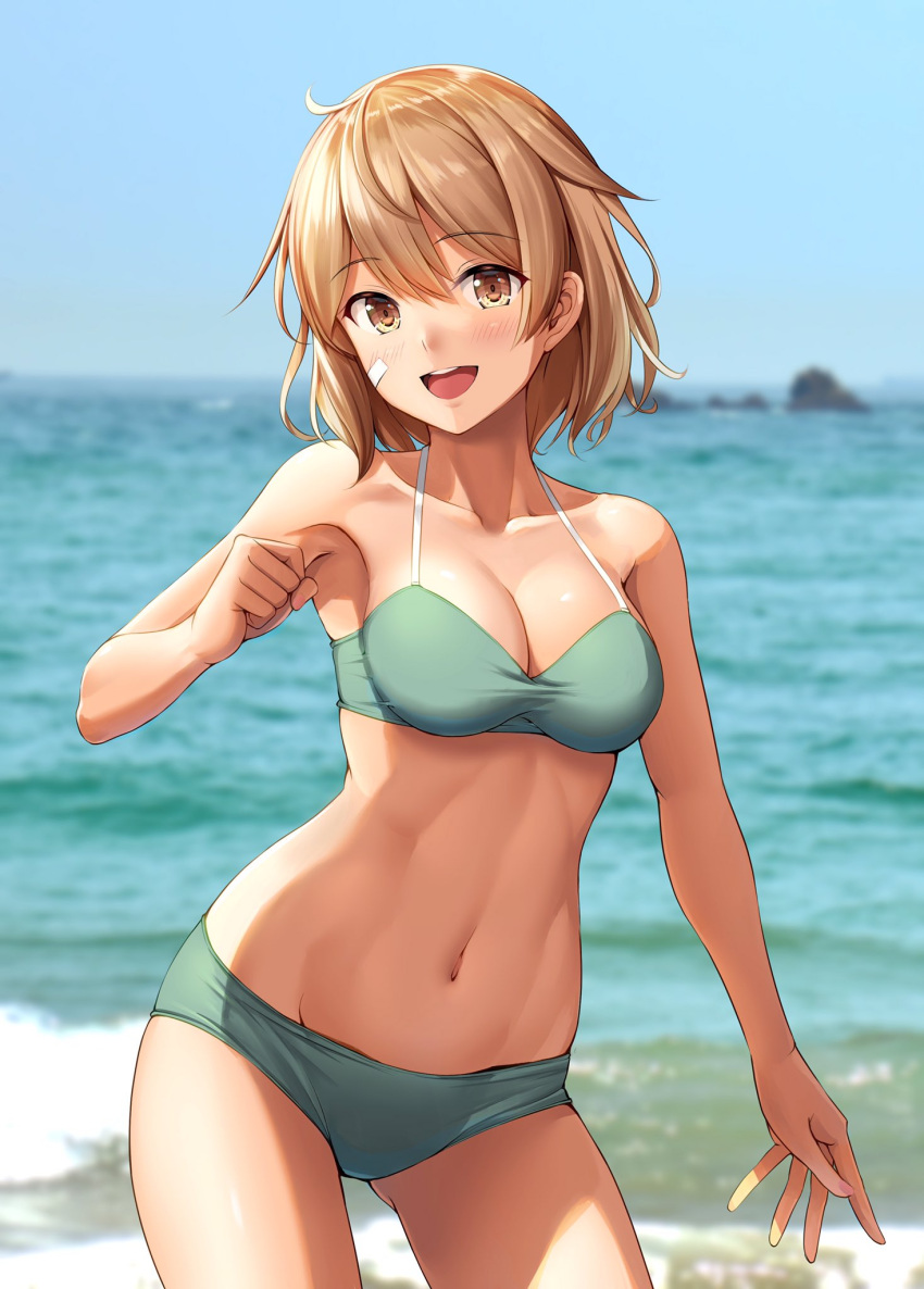 1girl bandaid bandaid_on_face bare_arms bare_legs bare_shoulders bikini blush breasts brown_eyes cleavage collarbone cowboy_shot day eyebrows_visible_through_hair green_bikini hair_between_eyes highres ichikawa_feesu kantai_collection light_brown_hair looking_at_viewer medium_breasts navel oboro_(kancolle) ocean open_mouth short_hair smile solo swimsuit upper_teeth