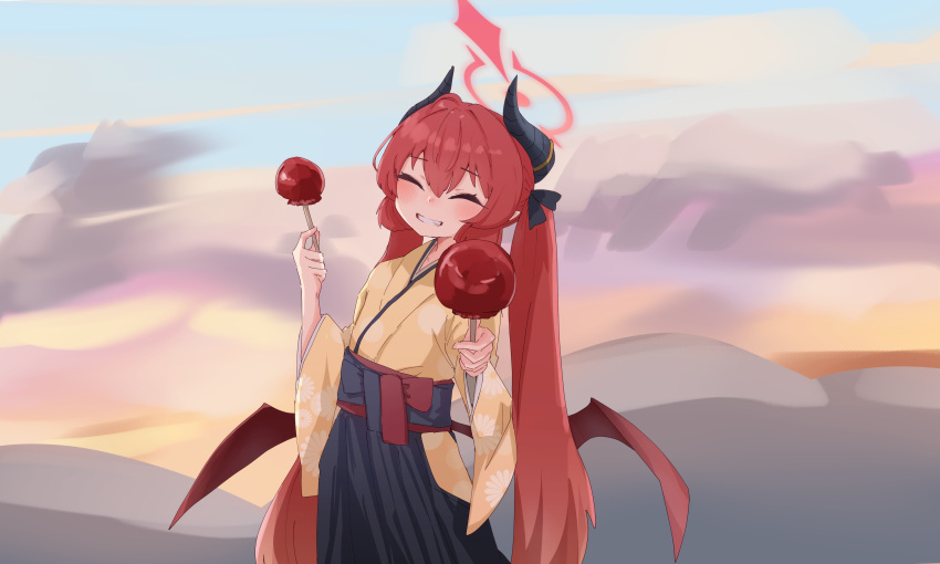 1girl absurdres black_hakama black_horns blue_archive blush brown_wings candy_apple closed_eyes demon_horns demon_wings facing_viewer food grin hair_between_eyes hakama halo highres holding holding_food horns japanese_clothes junko_(blue_archive) junko_(new_year)_(blue_archive) kimono long_hair official_alternate_costume red_hair red_halo smile solo suecovsky twintails wide_sleeves wings yellow_kimono