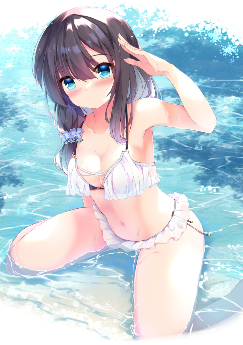 1girl arm_up bangs bare_arms bare_shoulders bikini black_hair blue_eyes blue_scrunchie blush breasts cleavage closed_mouth commentary_request eyebrows_visible_through_hair frilled_bikini frills fuuna hair_between_eyes hair_ornament hair_scrunchie highres long_hair looking_at_viewer medium_breasts navel original scrunchie shallow_water smile solo swimsuit water wet white_bikini