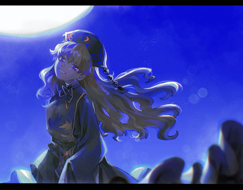 1girl bangs belt black_belt black_border black_dress black_headwear blonde_hair border bow bowtie breasts brown_vest chinese_clothes closed_mouth crescent dress hair_between_eyes hat junko_(touhou) kuzumiya_yuyu light long_hair long_sleeves looking_at_viewer medium_breasts moon moonlight night night_sky pom_pom_(clothes) red_eyes shadow sky smile solo tabard teeth touhou vest wide_sleeves yellow_bow yellow_neckwear