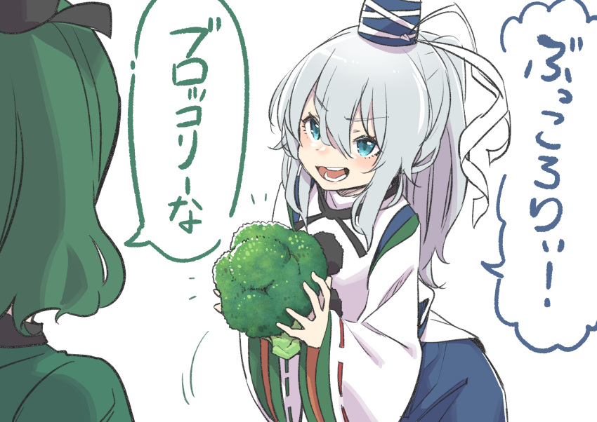 2girls absurdres bangs blue_eyes blue_headwear blue_skirt broccoli commentary dress eyebrows_visible_through_hair food green_dress green_hair grey_hair hat highres holding holding_food holding_vegetable jacket japanese_clothes kariginu kawayabug long_hair long_sleeves looking_at_another mononobe_no_futo multiple_girls open_mouth pom_pom_(clothes) ponytail ribbon-trimmed_sleeves ribbon_trim short_hair simple_background skirt soga_no_tojiko speech_bubble tate_eboshi teeth tongue touhou translated vegetable white_background white_jacket wide_sleeves