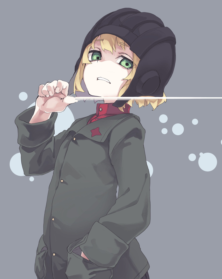 1girl absurdres blonde_hair girls_und_panzer green_eyes green_jacket grey_background hand_in_pocket hand_up helmet highres jacket katyusha_(girls_und_panzer) long_sleeves looking_at_viewer parted_lips pravda_school_uniform red_shirt reiga_(act000) school_uniform shirt short_hair simple_background solo