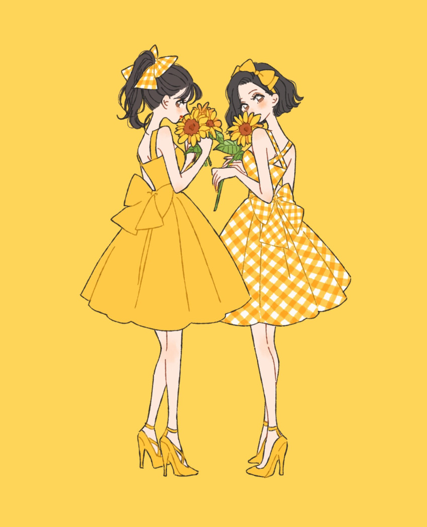 2girls back_bow bangs black_hair bob_cut bow brown_eyes color_coordination dress fashion flower from_behind gingham hair_bow headband high_heels highres holding holding_flower matching_outfit multiple_girls original ponytail rikuwo smelling_flower sundress sunflower yellow_background yellow_bow yellow_dress yellow_flower yellow_theme
