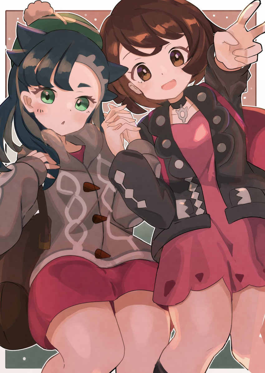 2girls :o asymmetrical_bangs backpack bag bangs black_hair black_jacket blush brown_eyes brown_hair choker cosplay dress gloria_(pokemon) gloria_(pokemon)_(cosplay) green_eyes grey_jacket hands_up hat highres holding_hands hood hooded_jacket jacket looking_at_viewer marnie_(pokemon) marnie_(pokemon)_(cosplay) multiple_girls open_mouth pink_dress pokemon pokemon_(game) pokemon_swsh red_dress smile umiru v yuri