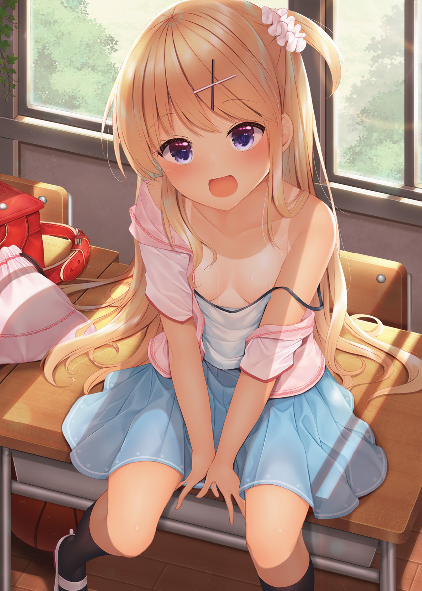 1girl :d backpack bag bangs blonde_hair blue_eyes blue_skirt blush breasts classroom cleavage collarbone desk eyebrows_visible_through_hair hair_ornament hair_scrunchie hairclip highres indoors kin-iro_mosaic kujou_karen long_hair looking_at_viewer minato_ojitan on_desk open_mouth pink_scrunchie purple_eyes randoseru school_bag scrunchie sitting sitting_on_desk skirt small_breasts smile solo tan tanlines very_long_hair window x_hair_ornament