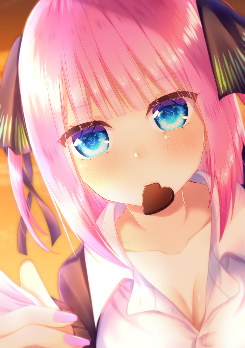 1girl absurdres bangs black_cardigan black_ribbon blue_eyes blunt_bangs blush breasts butterfly_hair_ornament candy cardigan chocolate cleavage collarbone eyebrows_visible_through_hair eyes_visible_through_hair food food_in_mouth go-toubun_no_hanayome hair_ornament heart heart-shaped_chocolate heart-shaped_pupils highres large_breasts looking_at_viewer mouth_hold nail_polish nakano_nino partially_unbuttoned pink_hair pink_nails ribbon shirt symbol-shaped_pupils twintails uniform valentine white_shirt xx_momomo_xx