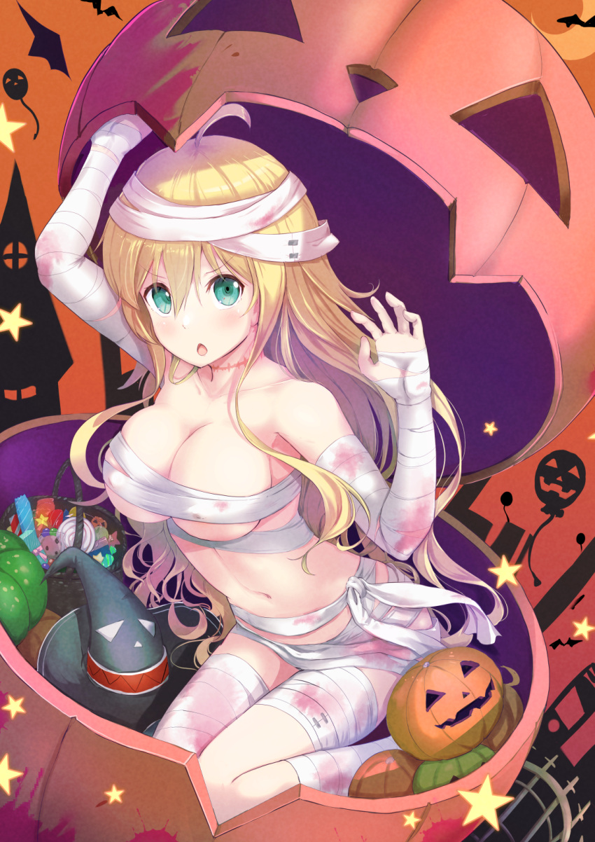 1girl ahoge bandages blonde_hair breasts candy commentary dies_irae eyebrows_visible_through_hair food green_eyes halloween halloween_costume hat highres jack-o'-lantern large_breasts long_hair looking_at_viewer marie_(dies_irae) mummy_costume naked_bandage navel okina_(805197) orange_background pumpkin scar scar_on_neck shinza_bansho_series solo very_long_hair witch_hat