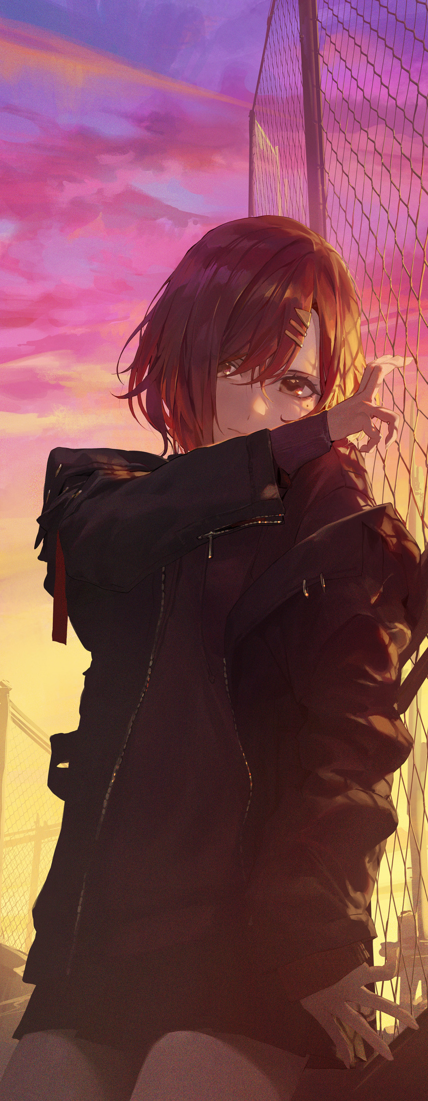 1girl absurdres against_fence black_jacket chain-link_fence commentary cowboy_shot fence highres higuchi_madoka idolmaster idolmaster_shiny_colors jacket long_sleeves looking_at_viewer mole mole_under_eye mossi open_clothes open_jacket red_eyes red_hair solo sunset zipper