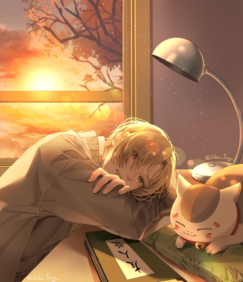 1boy bangs book desk desk_lamp highres indoors lamp lens_flare long_sleeves looking_at_viewer lying male_focus natsume_takashi natsume_yuujinchou nyanko on_pillow parted_bangs pillow school_uniform sitting solo sparkle sunlight sunset sweater yellow_eyes yellow_theme zoha