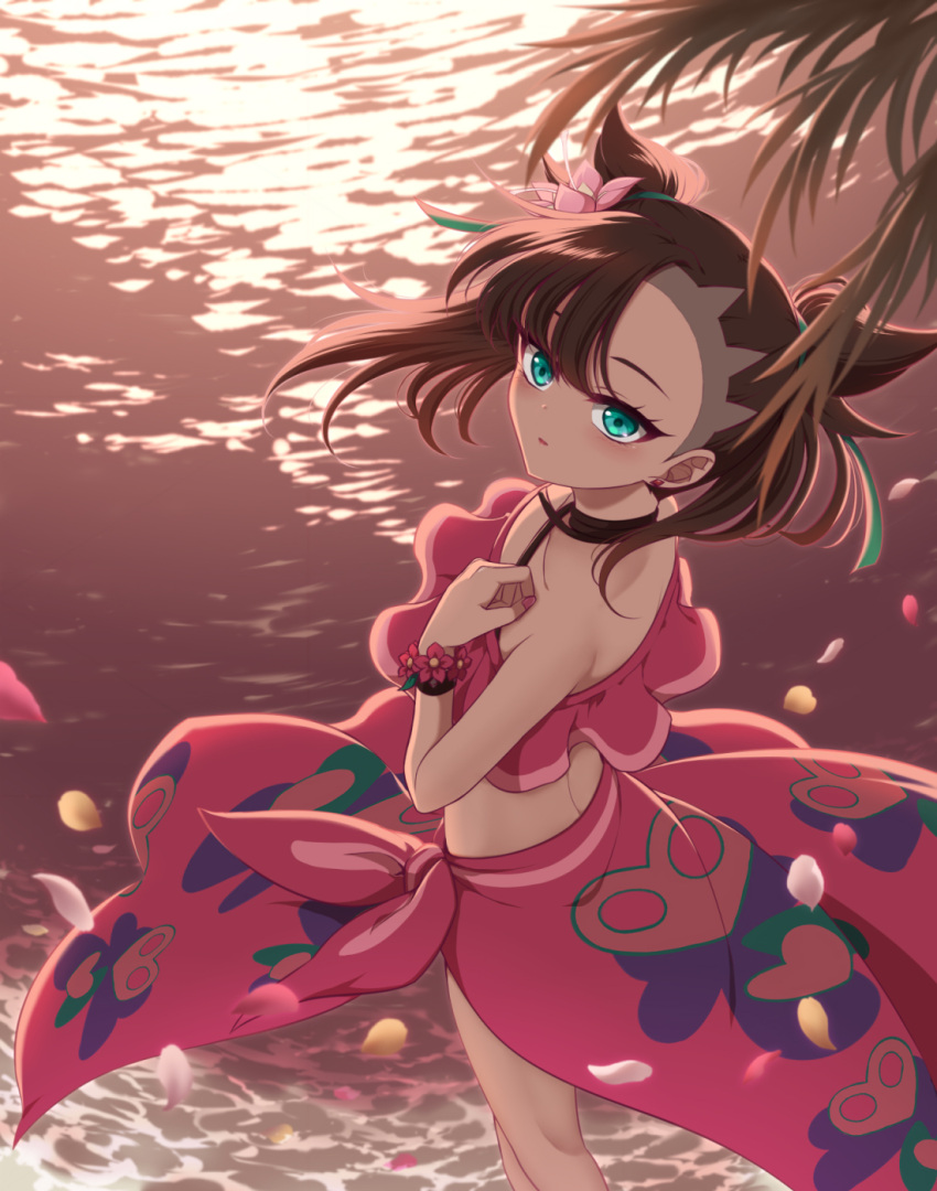 1girl asymmetrical_bangs bangs beach bikini black_choker black_hair blush choker commentary_request falling_petals feet_out_of_frame floating_hair flower flower_bracelet from_above green_eyes green_ribbon hair_flower hair_ornament hair_ribbon hand_up hibiscus highres kurobe_sclock long_hair marnie_(pokemon) official_alternate_costume parted_lips petals pink_nails pokemon pokemon_(game) pokemon_masters_ex red_bikini ribbon sarong solo sunset swimsuit twintails two_side_up water