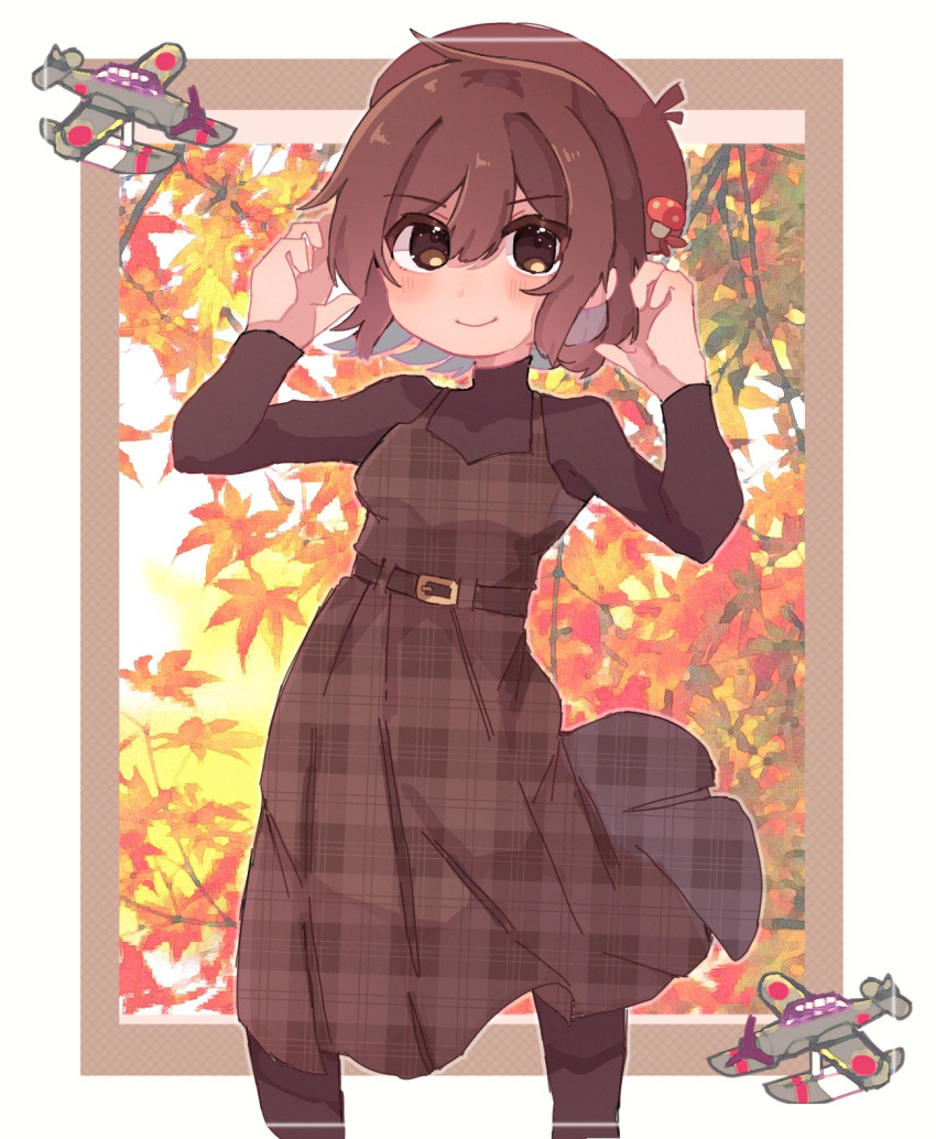 1girl aircraft alternate_costume autumn_leaves bangs beret blush brown_dress brown_eyes brown_hair brown_headwear brown_legwear brown_sweater dress eyebrows_visible_through_hair hagino_chihiro hair_between_eyes hat hat_ornament highres hyuuga_(kancolle) kantai_collection leaf long_sleeves one-hour_drawing_challenge pantyhose plaid plaid_dress short_hair smile solo sweater