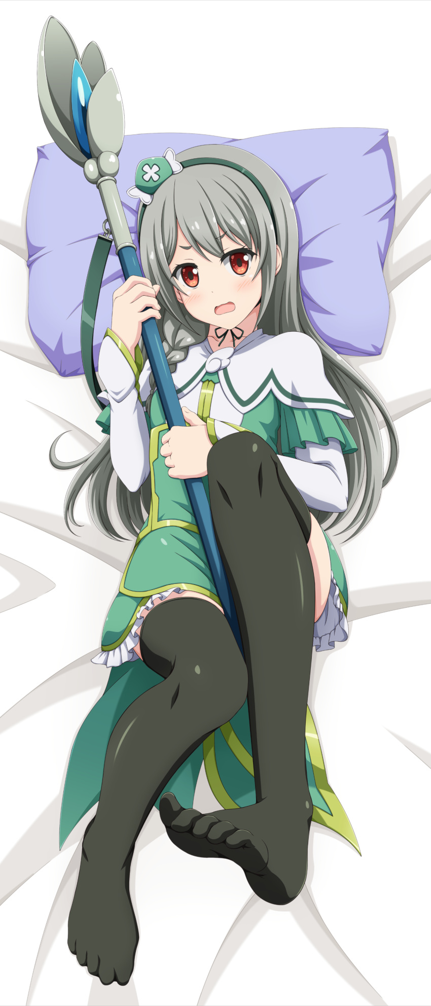 1girl absurdres bed_sheet black_thighhighs blush capelet dakimakura_(medium) dress flat_chest frilled_dress frills full_body futoku_no_guild green_dress green_hair hair_between_eyes hat highres holding holding_staff ishida_seito knee_up looking_at_viewer lying mage_staff maidena_angers mini_hat on_back on_bed open_mouth pillow red_eyes solo staff thighhighs toes white_capelet white_sleeves