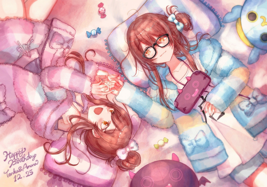 2girls :d anam95 blue_hoodie blue_shorts bow brown_eyes brown_hair candy debi_tarou food from_above glasses hair_between_eyes hair_bow hair_bun hair_ornament hair_scrunchie handheld_game_console happy_birthday highres hood hoodie idolmaster idolmaster_shiny_colors long_hair loungewear lying multiple_girls nail_polish nintendo_switch on_back osaki_amana osaki_tenka pillow pink_hoodie pink_shorts scrunchie shirt shorts smile stuffed_toy white_shirt