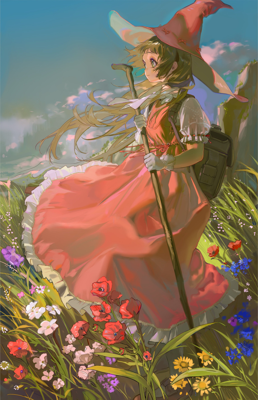 1girl absurdres backpack bag blue_flower blue_sky brown_hair cane cloud commentary day dress floating_hair flower frilled_dress frilled_sleeves frills from_side full_body gloves grass green_eyes hat highres holding holding_cane long_hair looking_afar looking_ahead meadow neck_ribbon original outdoors pink_dress pink_hat poppy_(flower) puffy_short_sleeves puffy_sleeves red_flower ribbon scenery short_sleeves sky smile solo standing symbol-only_commentary tamomoko white_gloves wind witch_hat