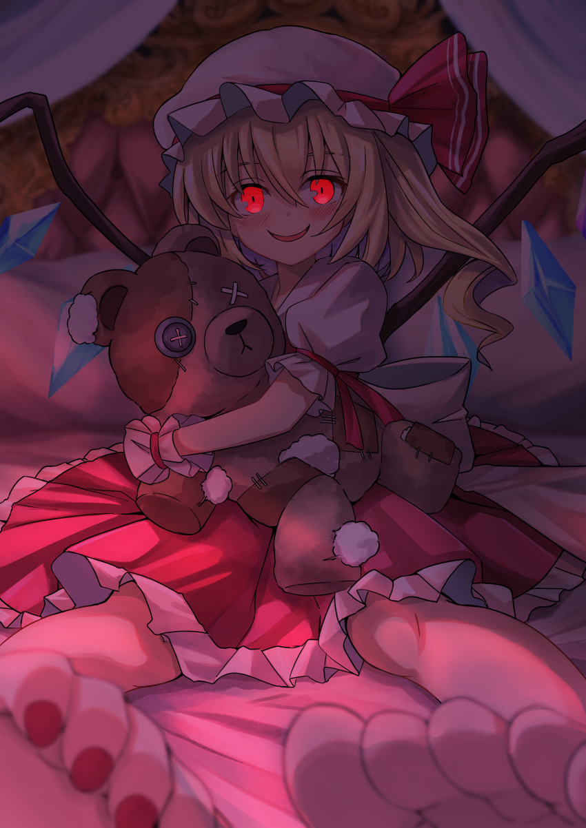 1girl absurdres back_bow barefoot blonde_hair bow button_eyes buttons crystal evil_smile fang flandre_scarlet glowing glowing_eyes hat hat_ribbon highres hugging_doll hugging_object long_hair looking_at_viewer mob_cap multicolored_wings on_bed one_side_up open_mouth puffy_short_sleeves puffy_sleeves red_eyes red_light red_nails red_skirt ribbon short_sleeves side_ponytail sitting skirt smile solo stuffed_animal stuffed_toy stuffing teddy_bear touhou white_bow white_hat wings wrist_cuffs yuuka_(a0240765)