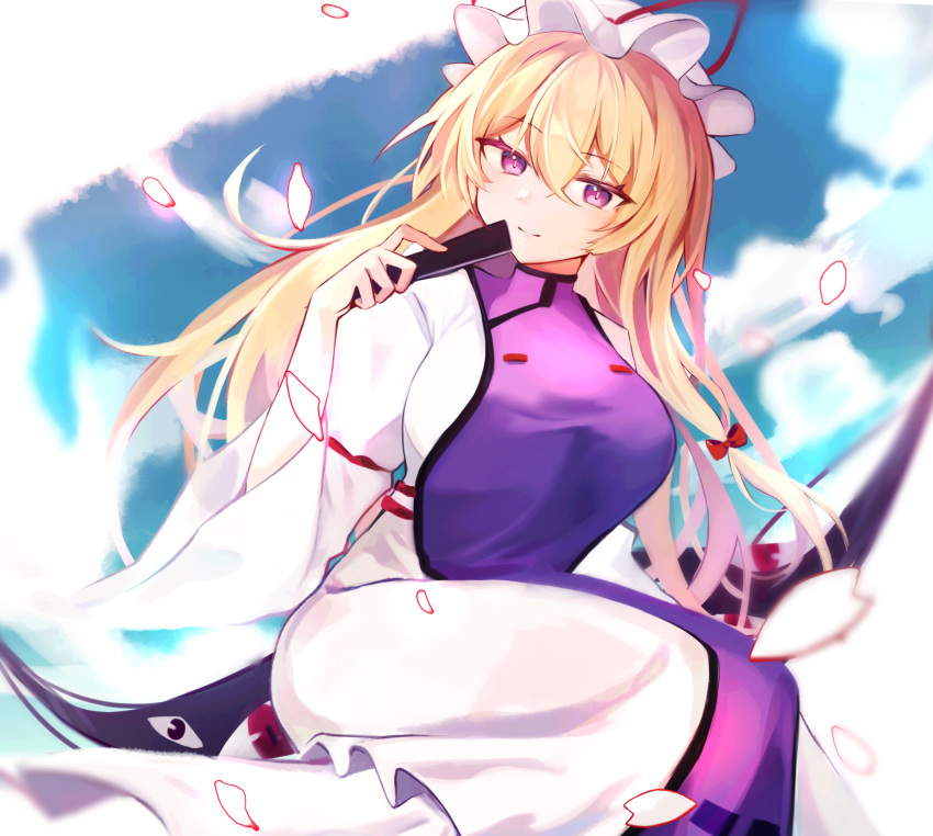 1girl absurdres arm_strap bangs blonde_hair blue_sky blurry bow bright_pupils cherry_blossoms closed_fan closed_mouth cloud cloudy_sky colored_eyelashes depth_of_field dress eyebrows_visible_through_hair floating folding_fan gap_(touhou) glowing_petals hair_between_eyes hair_bow hand_fan hat hat_ribbon head_tilt highres holding holding_fan long_sleeves looking_at_viewer mob_cap purple_eyes purple_tabard red_bow red_eyes red_ribbon ribbon saki_(14793221) shiny shiny_hair sidelocks sideways_glance sitting sky slit_pupils smile solo tabard touhou trigram white_dress white_headwear wide_sleeves wind yakumo_yukari