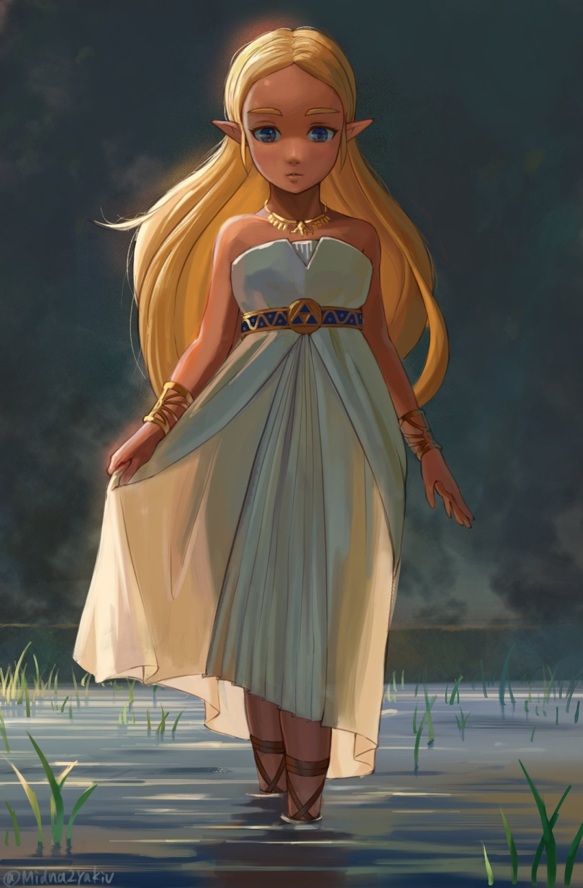 1girl bangs blonde_hair blue_eyes dress grass green_background gxp highres jewelry long_hair looking_at_viewer necklace off-shoulder_dress off_shoulder parted_bangs pointy_ears princess_zelda sandals see-through_silhouette solo the_legend_of_zelda the_legend_of_zelda:_breath_of_the_wild triforce twitter_username wading water white_dress