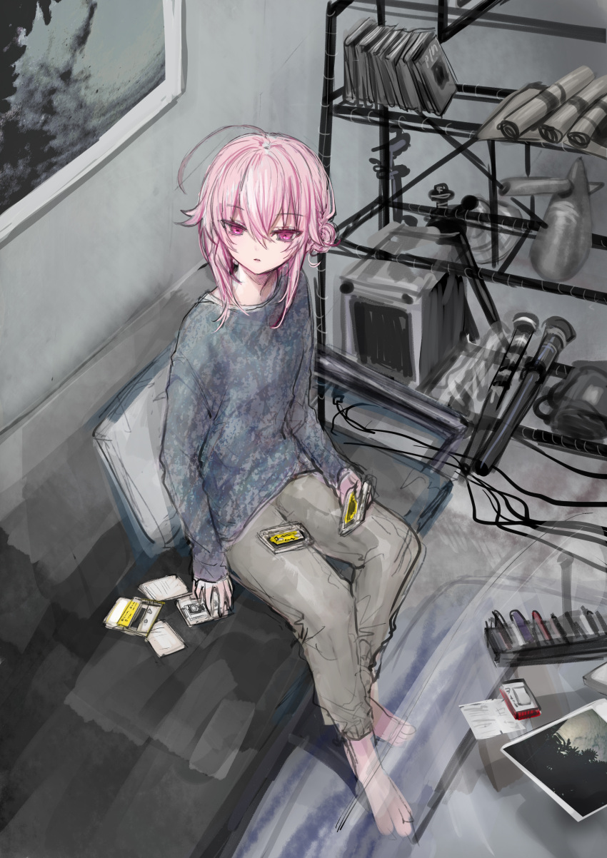 1girl absurdres ahoge bangs barefoot cassette_tape couch eyebrows_visible_through_hair glass_table grey_pants grey_shirt hair_between_eyes hair_bun highres indoors long_hair long_sleeves on_couch original pants parted_lips pillow pink_hair purple_eyes shiodome_oji shirt side_bun sitting sleeves_past_wrists solo table