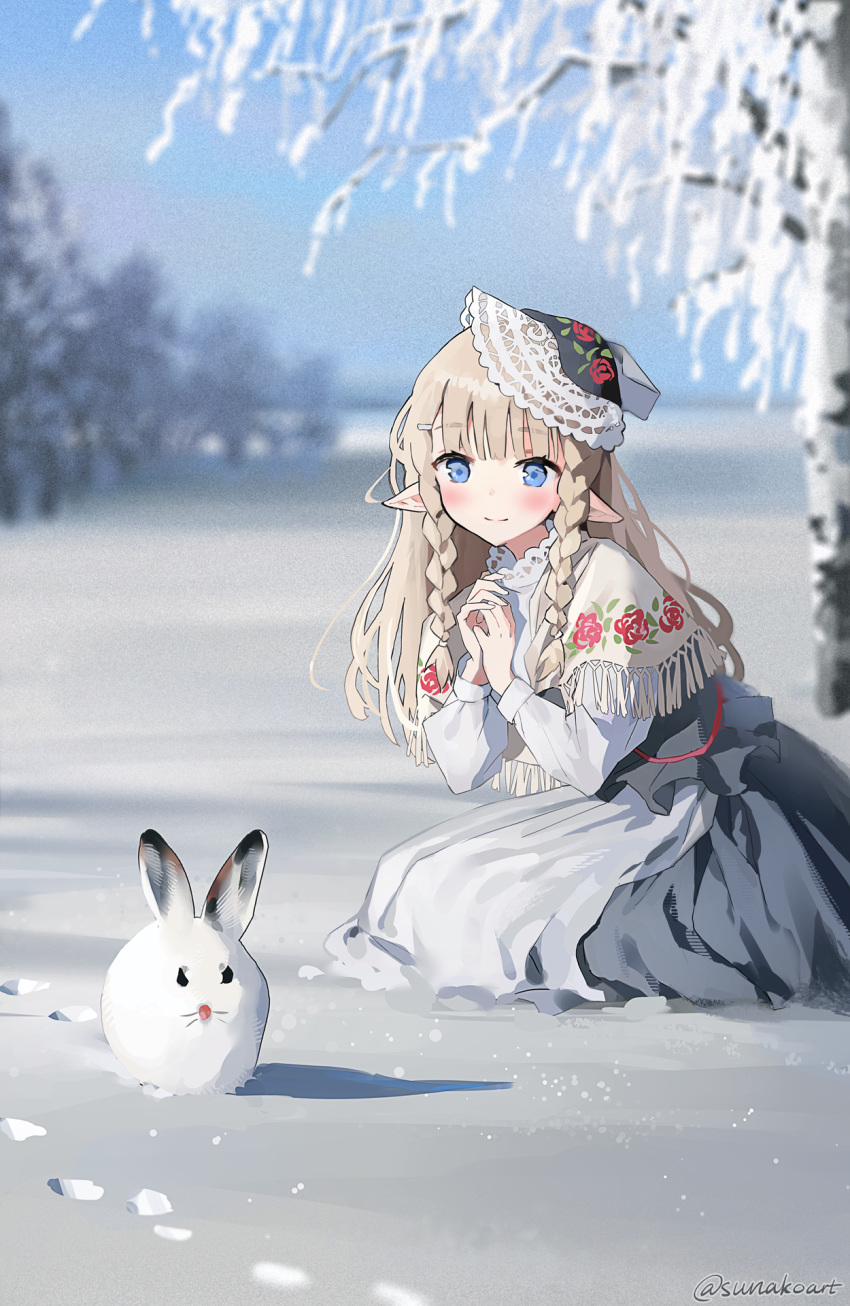 1girl bangs blonde_hair blunt_bangs blunt_ends blurry blush braid bunny depth_of_field elf field footprints highres lace-trimmed_collar lace-trimmed_headwear lace_trim looking_at_animal original outdoors own_hands_together pointy_ears print_capelet sidelocks snow squatting sunako_(veera) twitter_username winter