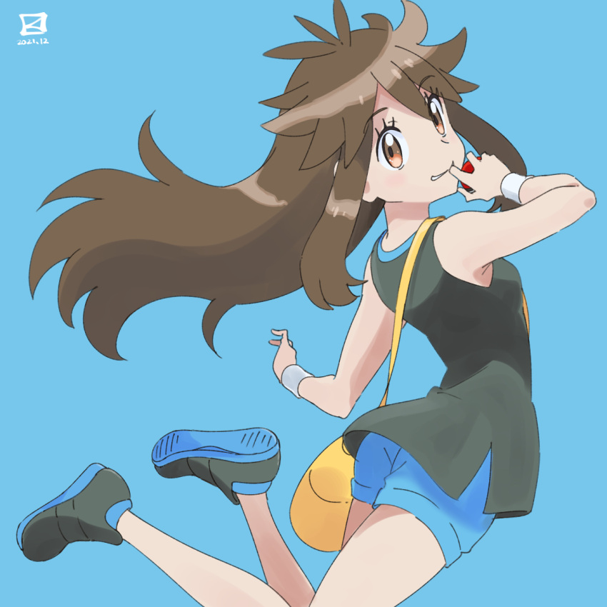 1girl bag bangs blue_background blue_shorts brown_eyes brown_hair commentary_request dated eyebrows_visible_through_hair eyelashes floating_hair from_side green_(pokemon) hair_flaps hand_up highres holding holding_poke_ball long_hair looking_to_the_side messenger_bag miyahara_takuya parted_lips poke_ball pokemon pokemon_(game) pokemon_lgpe shirt shoes shorts shoulder_bag sidelocks simple_background sleeveless sleeveless_shirt smile sneakers solo wristband