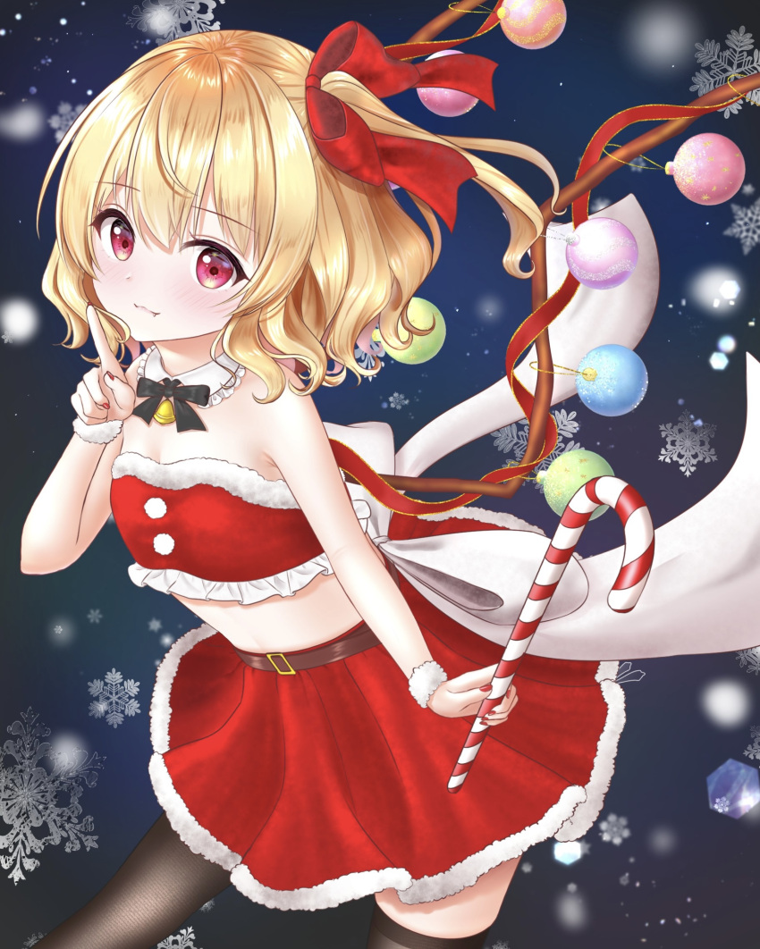 1girl :3 alternate_costume back_bow bangs bare_shoulders bell belt black_legwear black_neckwear black_ribbon blonde_hair blush bow brown_belt buckle candy candy_cane christmas closed_mouth commentary_request detached_collar eyebrows_visible_through_hair eyelashes fang fang_out flandre_scarlet food frilled_shirt_collar frills fur-trimmed_skirt fur-trimmed_tube_top fur_trim gradient gradient_background hair_ribbon highres index_finger_raised jingle_bell looking_at_viewer midriff nail_polish nyanyanoruru one_side_up pom_pom_(clothes) red_eyes red_nails red_ribbon red_skirt ribbon sash shiny shiny_hair short_hair side_ponytail skirt snowflake_background snowing solo standing stomach strapless thighhighs touhou tube_top white_sash wings wrist_cuffs