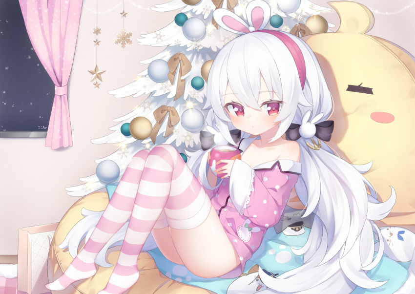 1girl animal_ears azur_lane bag bangs breasts christmas christmas_ornaments christmas_tree cleavage closed_mouth commentary_request cup curtains eyebrows_visible_through_hair hair_between_eyes hairband highres holding holding_cup indoors knees_up kokone_(coconeeeco) laffey_(azur_lane) long_hair long_sleeves looking_at_viewer low_twintails manjuu_(azur_lane) meowfficer_(azur_lane) no_shoes off_shoulder pajamas paper_bag pink_pajamas pink_shirt polka_dot polka_dot_pajamas polka_dot_shirt rabbit_ears red_eyes red_hairband shirt sleeves_past_wrists small_breasts solo striped striped_legwear twintails very_long_hair white_hair wide_sleeves window