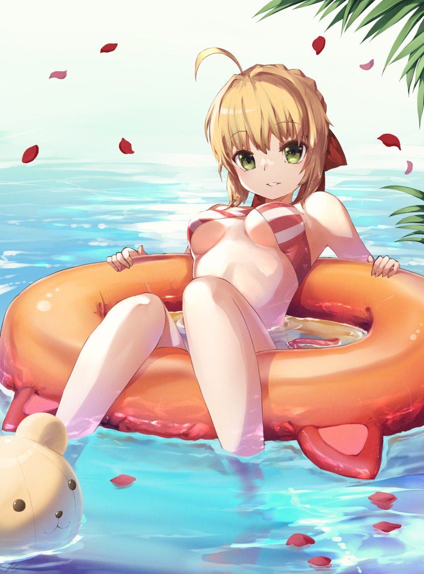 1girl absurdres ahoge bare_shoulders bikini blonde_hair breasts commentary fate/grand_order fate_(series) floating green_eyes hair_intakes hair_ribbon highres innertube_with_ears knees_together_feet_apart looking_at_viewer medium_breasts nero_claudius_(fate) nero_claudius_(swimsuit_caster)_(fate) orange_innertube outdoors parted_lips petals petals_on_liquid red_ribbon ribbon rose_petals side-tie_bikini_bottom sitting smile soaking_feet solo striped striped_bikini swimsuit taka.yana underboob water