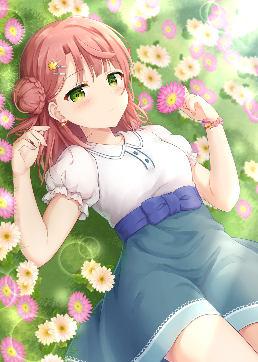 1girl absurdres blunt_bangs blush braid braided_bun breasts closed_mouth collarbone collared_shirt commentary earrings flower green_eyes green_skirt hair_bun hair_ornament hairclip half-closed_eyes half_updo hands_up high-waist_skirt highres holding holding_flower jewelry lens_flare looking_at_viewer love_live! love_live!_nijigasaki_high_school_idol_club lying medium_breasts medium_hair on_back on_grass pink_flower pink_hair puffy_short_sleeves puffy_sleeves shirt short_sleeves single_side_bun skirt smile solo split_mouth swept_bangs uehara_ayumu white_flower white_shirt yutuki_ame