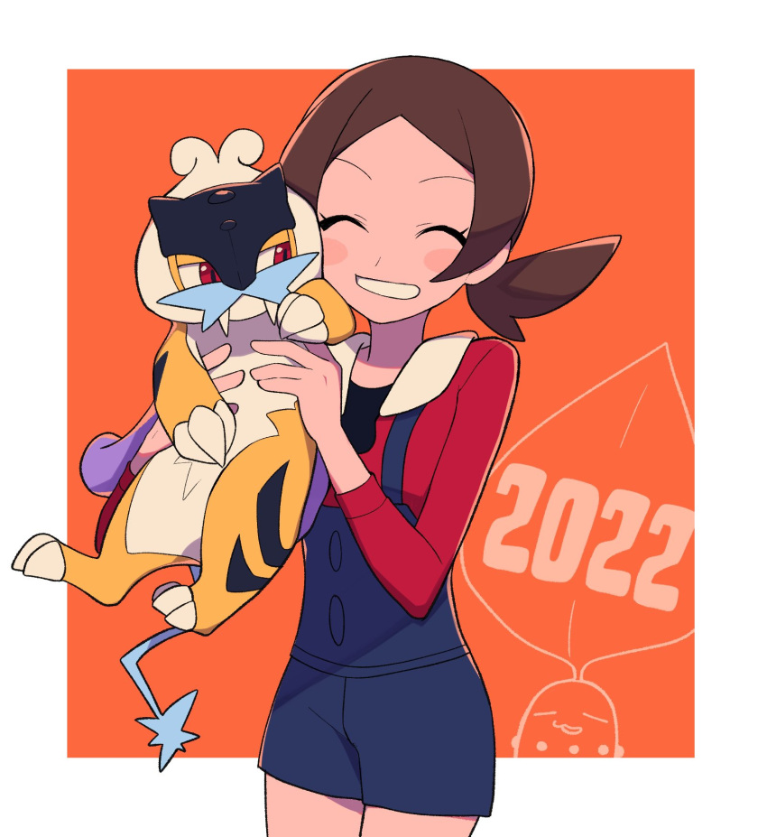 1girl 2022 blue_overalls border brown_hair chikorita commentary_request grin hands_up highres holding holding_pokemon long_hair lyra_(pokemon) miniature new_year no_hat no_headwear orange_background overalls pokemon pokemon_(creature) pokemon_(game) pokemon_hgss raikou red_shirt shirt smile twintails tyako_089 white_border