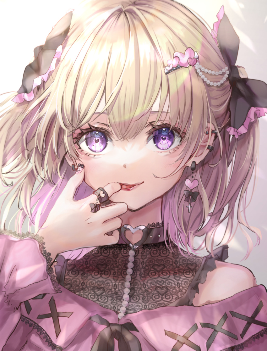 1girl bangs black_bow blonde_hair blouse bow choker commentary_request ear_piercing earrings finger_in_mouth frilled_bow frills hair_between_eyes hair_bow heart heart-shaped_pupils heart_ring highres jewelry lace light_blush lips looking_at_viewer medium_hair original piercing pink_blouse purple_eyes ring shironeko_yuuki solo standing swept_bangs symbol-shaped_pupils upper_body