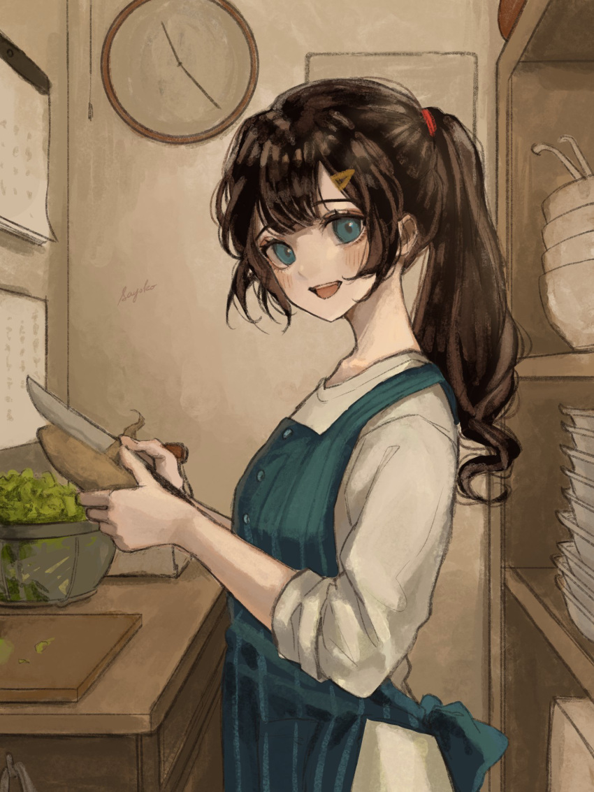 1girl apron bangs blue_apron blue_eyes blush bowl breasts brown_hair clock commentary_request cooking cutting_board food hair_ornament hair_tie hairclip hands_up highres holding holding_food holding_knife indoors knife long_hair looking_at_viewer open_mouth original peeling ponytail potato sayosny2 shirt signature sleeves_pushed_up small_breasts smile solo upper_body white_shirt
