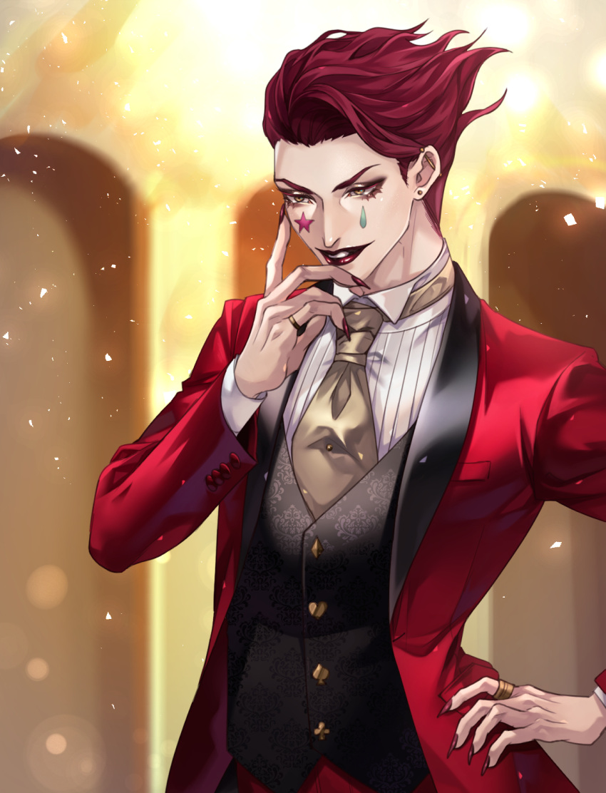 1boy black_vest blurry blurry_background ear_piercing earrings facial_mark hand_on_hip highres hisoka_morow hunter_x_hunter jewelry kitikumeganer lipstick makeup male_focus necktie piercing red_hair red_nails red_suit ring smile solo standing star_(symbol) star_facial_mark stud_earrings teardrop_facial_mark vest