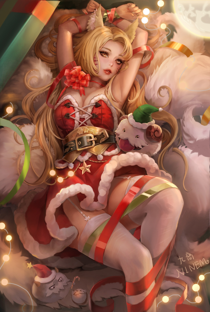 1girl ahri_(league_of_legends) animal_ears armpits arms_up bangs blonde_hair bound bound_wrists bow breasts candy candy_cane character_request choker cleavage dress facial_mark feet_out_of_frame food fox_ears fox_girl fox_tail fur-trimmed_dress fur_trim garter_straps green_headwear hat highres horns large_breasts league_of_legends looking_at_viewer lying on_back parted_lips poro_(league_of_legends) red_bow red_choker red_dress red_ribbon ribbon santa_dress santa_hat smile solo tail thighhighs tongue tongue_out whisker_markings xiuluoyi00