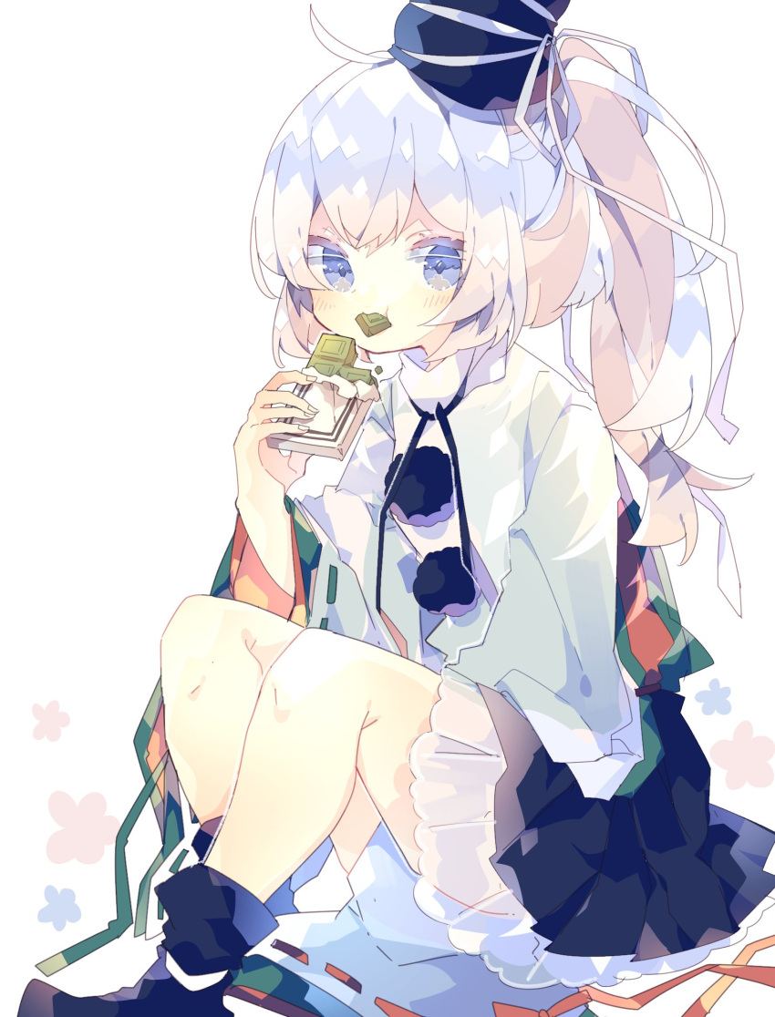 1girl between_legs biting blue_eyes blue_skirt blush candy chocolate chocolate_bar eating flower_(symbol) food frilled_skirt frills hand_between_legs hat highres japanese_clothes kariginu layered_clothing long_hair looking_at_viewer mononobe_no_futo neck_ribbon nikorashi-ka on_floor pom_pom_(clothes) ponytail ribbon ribbon-trimmed_sleeves ribbon_trim shoes sitting skirt sleeves_past_fingers sleeves_past_wrists tate_eboshi thick_eyelashes touhou white_background white_hair wide_sleeves wrapper