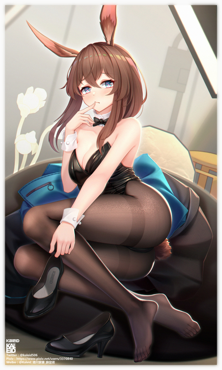 1girl absurdres amiya_(arknights) animal_ears arknights artist_name bean_bag_chair black_bow black_bowtie black_footwear black_legwear black_leotard blue_eyes bow bowtie breasts brown_hair collar detached_collar finger_to_mouth grey_background hair_between_eyes high_heels highres holding holding_clothes holding_footwear kaleid leotard long_hair looking_at_viewer lying medium_breasts pantyhose playboy_bunny rabbit_ears rabbit_girl rabbit_tail shoes shoes_removed solo tail thighband_pantyhose thighs white_collar white_wrist_cuffs