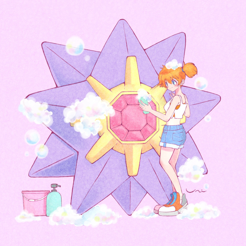 1girl blue_eyes blush bucket cleaning closed_mouth commentary_request crop_top denim denim_shorts full_body hair_between_eyes highres misty_(pokemon) orange_footwear orange_hair pokemon pokemon_(creature) pokemon_lgpe purple_background short_hair shorts simple_background smile soap soap_bubbles standing starmie uni_uni_88