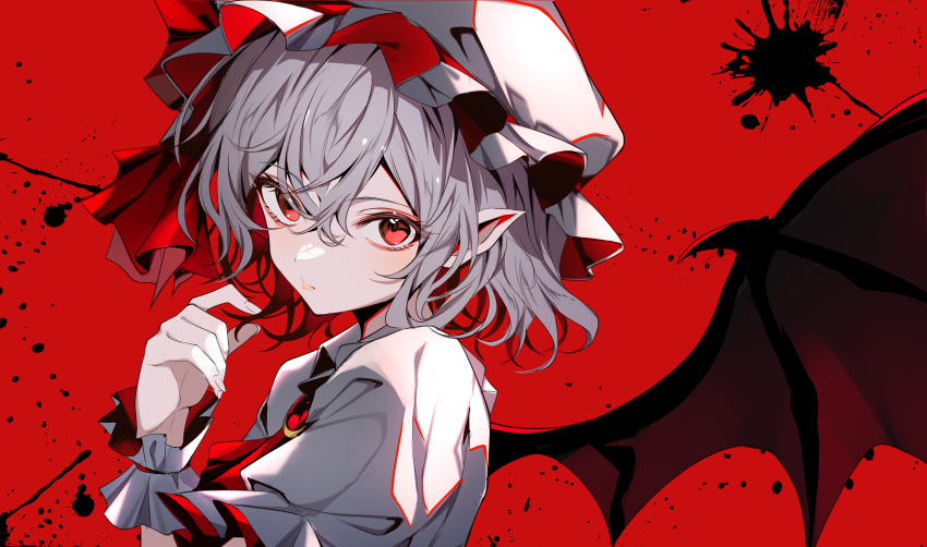 1girl absurdres ascot bat_wings closed_mouth commentary_request eyelashes gem grey_hair hair_between_eyes hand_up hat highres lips looking_at_viewer mob_cap pointy_ears red_ascot red_background red_eyes red_gemstone remilia_scarlet shirt short_hair short_sleeves simple_background solo touhou tsurime upper_body white_hat white_shirt white_wrist_cuffs wings wrist_cuffs yamanakaume