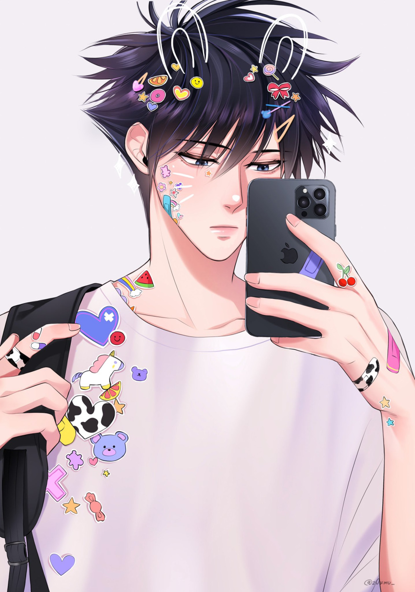 1boy apple_inc. backpack bag black_hair blue_eyes cellphone closed_mouth drawn_ears fushiguro_megumi hair_between_eyes hair_ornament hairpin hand_up highres holding holding_phone jujutsu_kaisen looking_at_phone male_focus phone shirt short_hair simple_background smartphone solo spiked_hair sticker upper_body white_background white_shirt z0umu