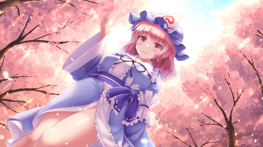 1girl :d blue_headwear blue_kimono blush center_frills cherry_blossoms commentary_request dutch_angle eyebrows_visible_through_hair frilled_kimono frills hat highres japanese_clothes kimono long_sleeves lzh medium_hair mob_cap open_mouth petals pink_eyes pink_hair saigyouji_yuyuko sash smile solo thig touhou tree triangular_headpiece wide_sleeves