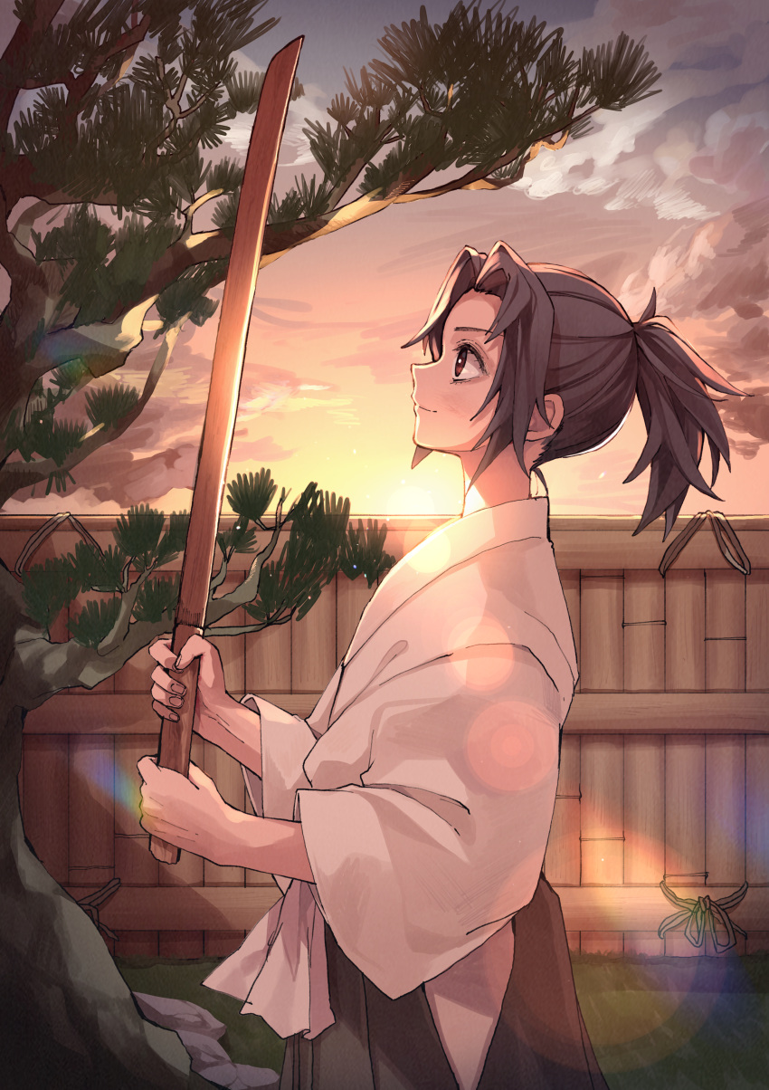 1boy absurdres black_hair bokken bruise bruise_on_face child cloud cowboy_shot day fence from_side hakama highres holding holding_sword holding_weapon injury japanese_clothes kimetsu_no_yaiba long_sleeves male_focus outdoors ponytail profile red_eyes sky smile solo sun sword tree tsugikuni_michikatsu weapon wide_sleeves wooden_sword yogukasu younger