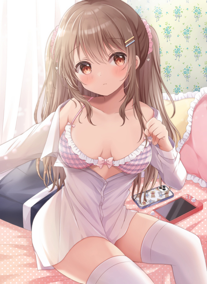 1girl bag bangs bed bra breasts brown_eyes brown_hair cellphone closed_mouth collarbone commentary_request curtains dress_shirt eyebrows_visible_through_hair frilled_bra frilled_pillow frills hair_between_eyes hair_ornament hair_scrunchie hairclip highres indoors long_hair long_sleeves looking_at_viewer nintendo_switch on_bed original phone pillow pink_bra sakura_(ichisakupink) school_bag scrunchie shirt sitting small_breasts smartphone smartphone_case solo thighhighs twintails underwear white_legwear white_shirt