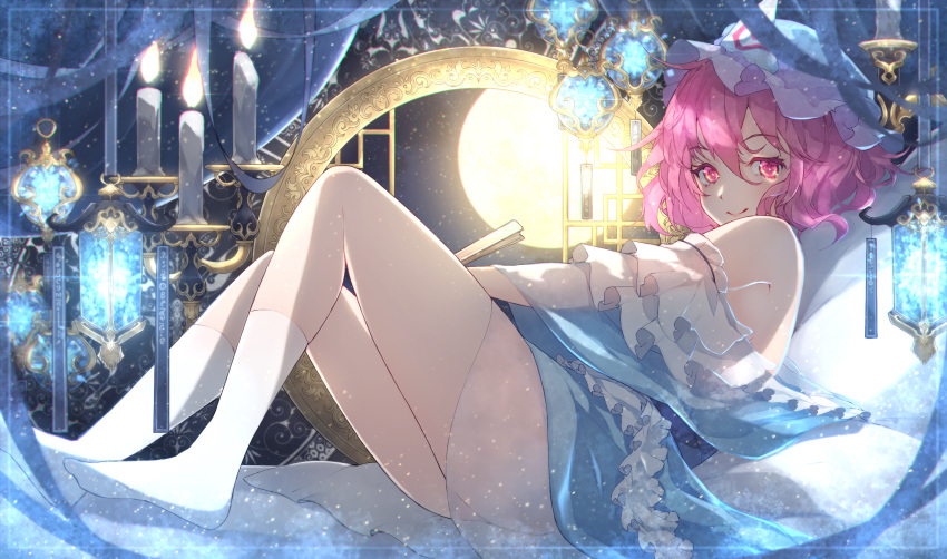 1girl bangs bare_shoulders blue_headwear candle chiroru_(cheese-roll) closed_fan closed_mouth eyebrows_visible_through_hair folding_fan from_side hand_fan highres holding holding_fan indoors knees_up lamp looking_at_viewer pink_eyes pink_hair saigyouji_yuyuko short_hair sitting smile solo touhou triangular_headpiece white_legwear