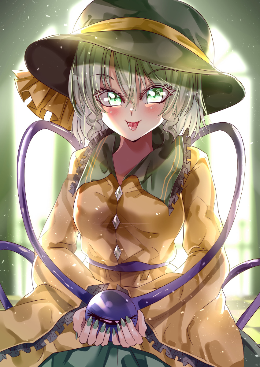 1girl absurdres black_headwear blouse blurry blurry_background blush breasts checkered_floor commentary_request eyeball eyebrows_visible_through_hair frilled_shirt_collar frilled_sleeves frills green_eyes green_nails green_skirt hair_between_eyes hat hat_ribbon highres holding indoors komeiji_koishi light_green_hair long_sleeves looking_at_viewer maboroshi_mochi nail_polish ribbon skirt small_breasts solo third_eye tongue tongue_out touhou wide_sleeves yellow_blouse yellow_ribbon