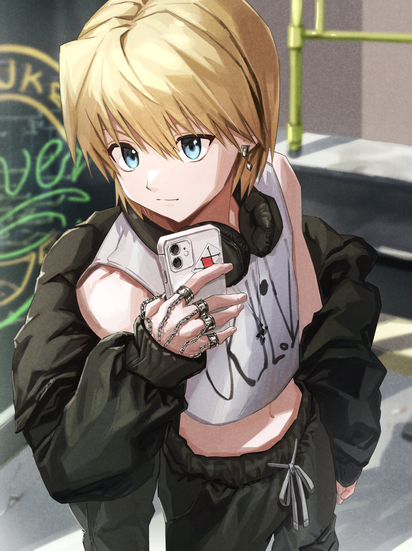 1boy absurdres akira_(nupekwa) alternate_costume bangs bishounen blonde_hair chain cropped_shirt feet_out_of_frame from_above green_eyes hair_between_eyes headphones headphones_around_neck highres holding holding_phone hunter_x_hunter jacket jacket_partially_removed kurapika male_focus midriff phone short_hair smile solo tank_top white_tank_top