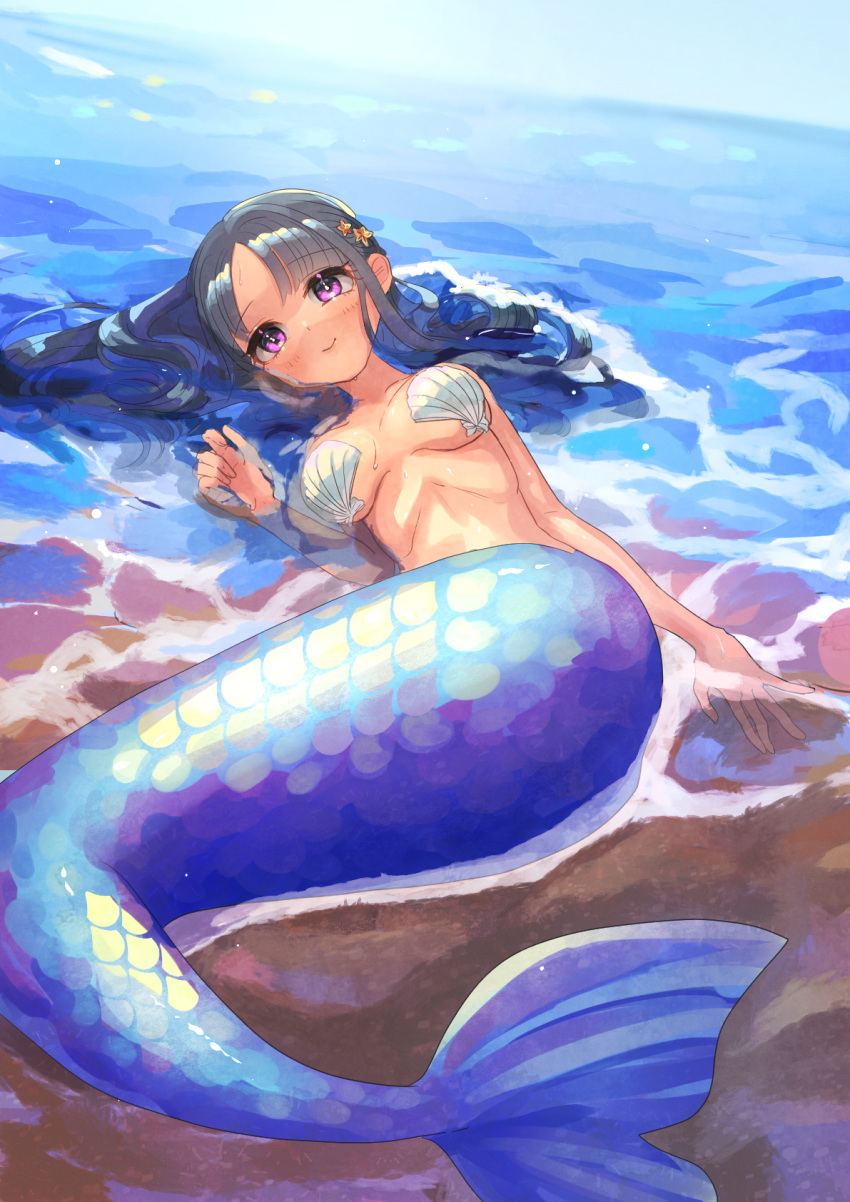 1girl bangs black_hair breasts hair_behind_ear highres long_hair looking_at_viewer lying medium_breasts mermaid momotsuki_kurumi monster_girl ocean on_back open_hand original parted_bangs purple_eyes shell shell_bikini shore smile solo starfish_hair_ornament water