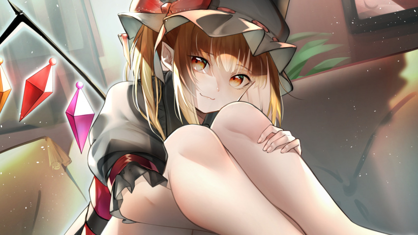 1girl bangs blonde_hair crystal curtains feet_out_of_frame flandre_scarlet hat highres indoors knees_up light_particles looking_at_viewer mob_cap pero_(peroneko0510) puffy_short_sleeves puffy_sleeves red_eyes red_ribbon ribbon shirt short_sleeves sitting smile solo thighs touhou vest white_shirt window wings