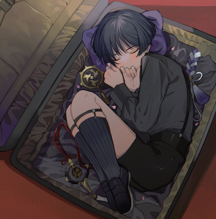 1boy bishounen black_hair black_shirt briefcase closed_eyes commentary_request genshin_impact highres knees_to_chest male_focus nakura_hakuto pillow scaramouche_(genshin_impact) shirt shoes short_hair shorts skindentation socks solo suspenders