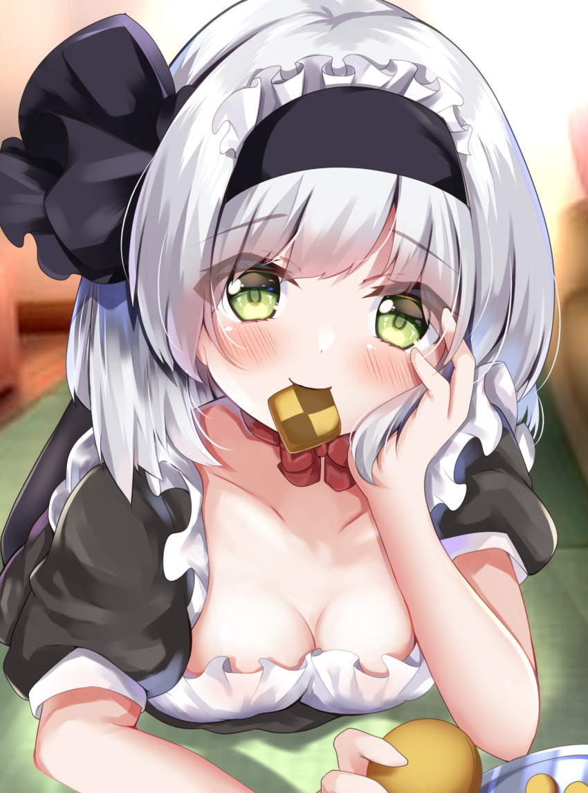 1girl absurdres alternate_costume bangs black_hairband blush breasts cleavage eyebrows_visible_through_hair face food_in_mouth green_eyes grey_hair hairband hand_on_own_face highres konpaku_youmu looking_at_viewer maid shirotsuki_shirone short_hair short_sleeves solo touhou