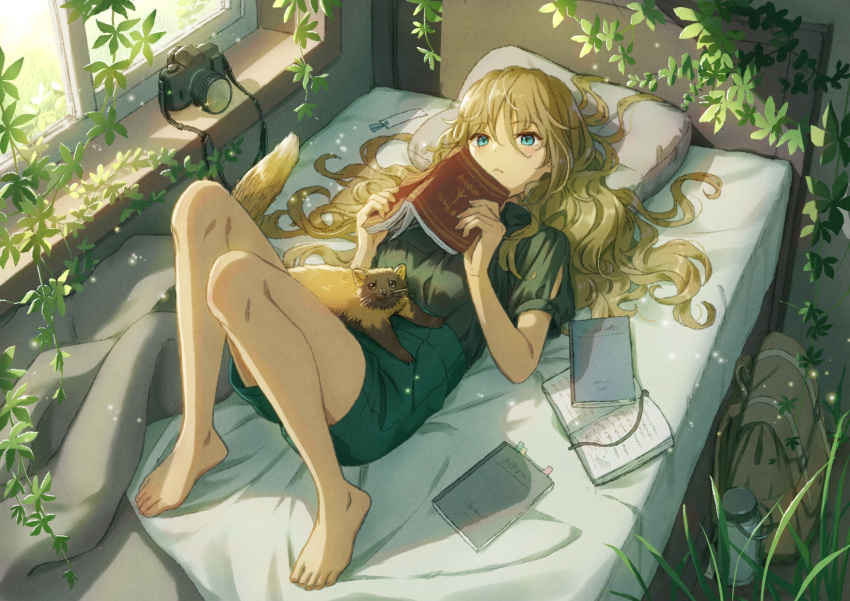 1girl animal backpack bag bangs bare_legs barefoot bed_sheet blanket blue_eyes blush book breasts brown_bag brown_hair camera closed_mouth commentary_request feet foliage full_body grass green_shirt green_shorts hair_between_eyes hair_spread_out highres indoors long_hair looking_at_viewer lying nekotama_(artist) on_back on_bed open_book original shirt shirt_tucked_in short_sleeves shorts solo window